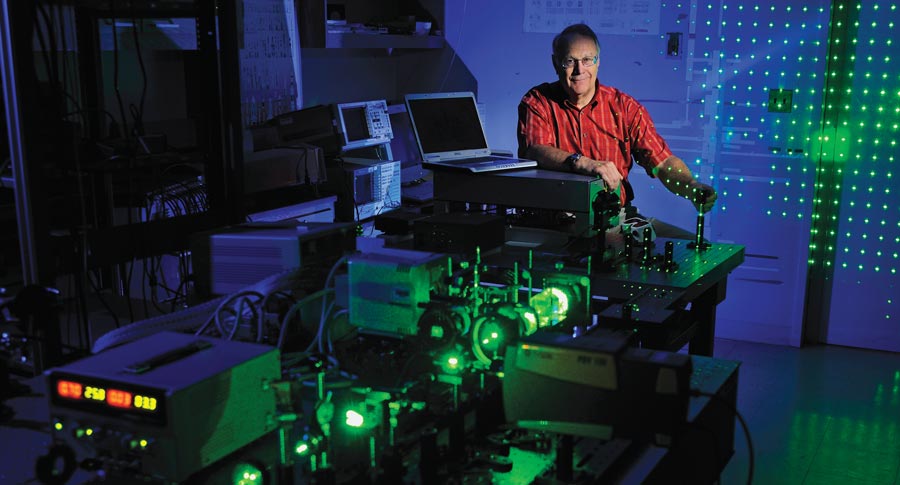 Dr. Jim Sabatier with the prototype of the multibeam laser doppler vibrometer he developed.